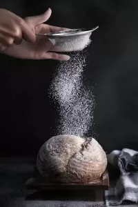 Sifting flour over bread analogy for helping students to sift information